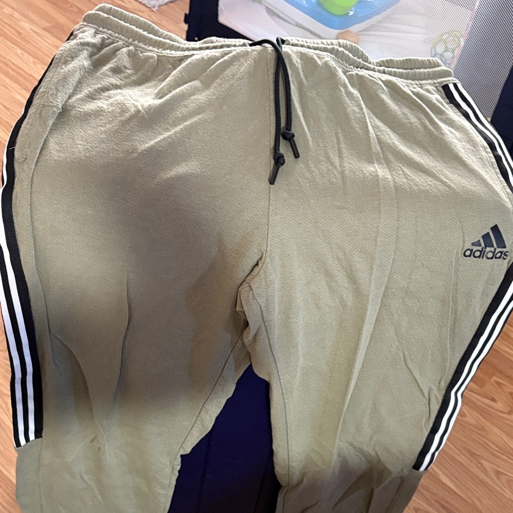Adidas men’s Khaki Joggers with Black Stripes